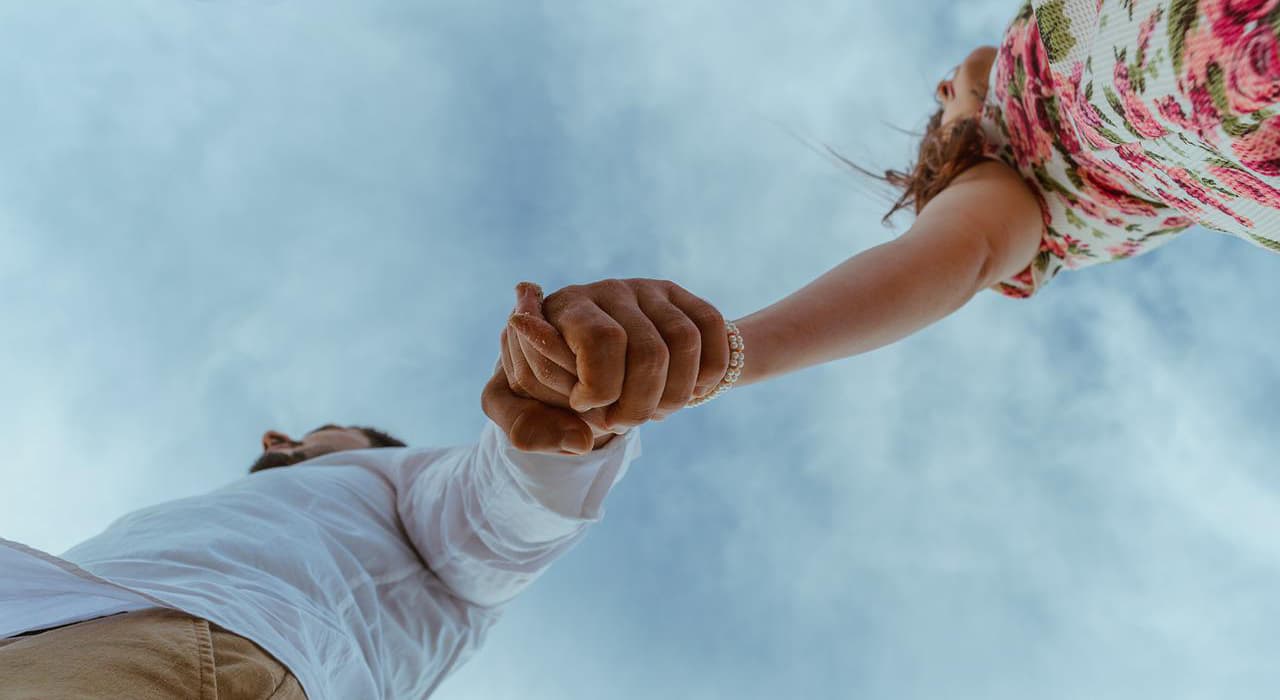 Couple holding hands